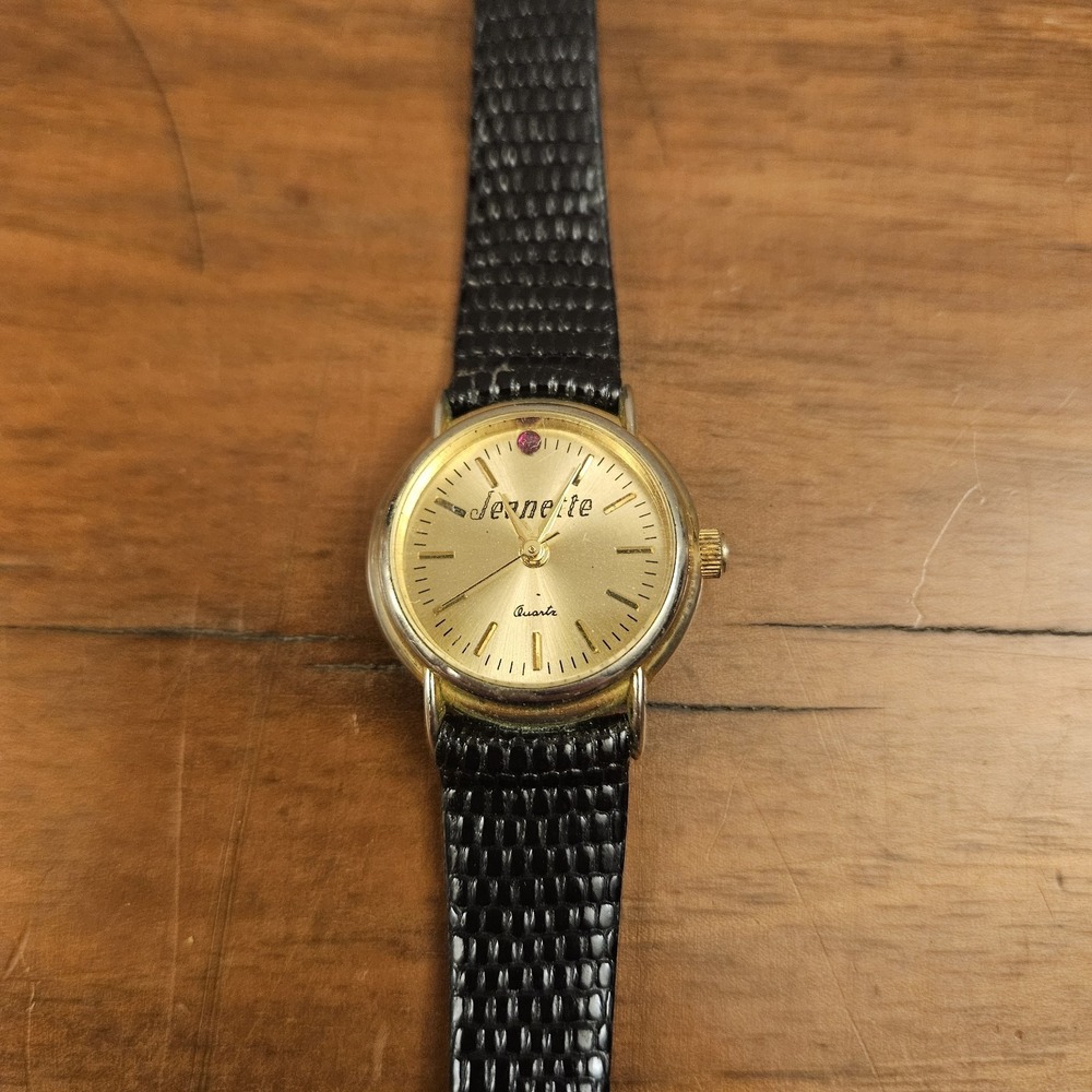 Jeanette Quartz Watch Gold Tone Black Textured Band Buckle Gold Bezel‎